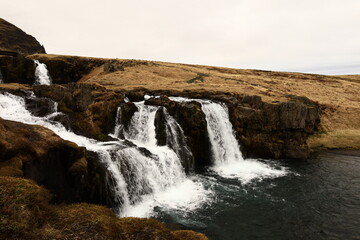Kirkjufellsfoss is a waterfall in West Iceland on the Snæfellsnes peninsula