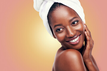 Happy woman and skincare with towel in studio for beauty, dermatology and mockup on gradient or...