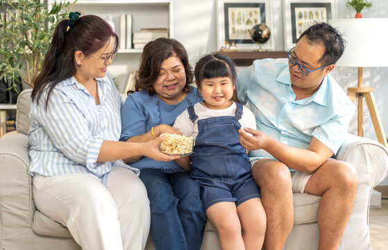 Portrait of enjoy happy love asian family father and mother with cute little asian girl child smiling play and having fun moments good time, care, kid, support, insurance, child, at home