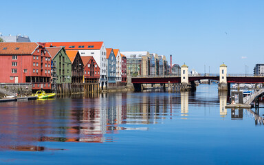 Naklejka premium Historic town centre Bakklandet in Trondheim in Norway, famous tourist attraction