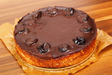 Chocolate Topped Sponge Cake with Prunes and Toffee Sauce