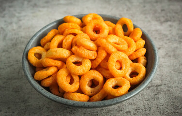Snack on cheese flavored rings in a bowl