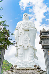 Fototapeta na wymiar Statue of Buddha Amitabha. Tong Lam Lo Son Pagoda. Vietnam, a suburb of Nha Trang. The country's largest statue of Buddha Amitabha.