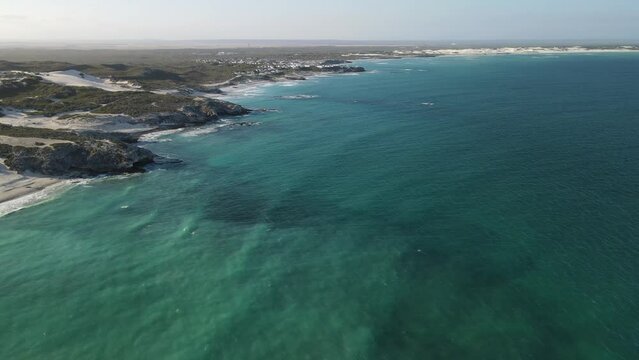 South African beautiful village Arniston embedded in Sand Dunes and a turquoise sea coast line