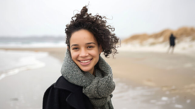 Young biracial woman greets warmly from her modern home on a video call.