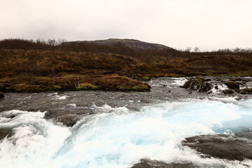 Brúará is a spring-fed river in West Iceland which runs by the boundaries of municipalities Biskupstungur and Grímsnes