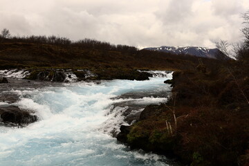Brúará is a spring-fed river in West Iceland which runs by the boundaries of municipalities Biskupstungur and Grímsnes