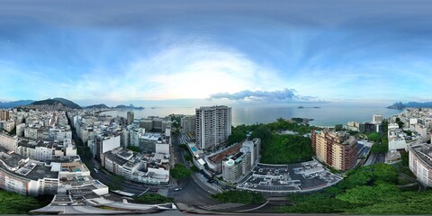 360 aerial photo taken with drone over neighborhood at end of peninsula in Ipanema 