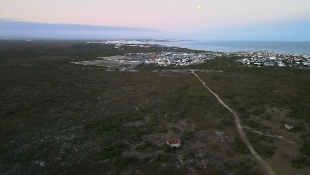 South African beautiful village Arniston embedded in Sand Dunes and a turquoise sea coast line