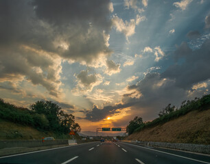 Stormy sunset on the highway near Colleferro, Rome, Italy