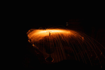 Abstract background of steel wool fireworks on Hat Chom Dao Na Tan, Na Tan District, Ubon...