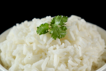 Close up, White rice in bowl, black background