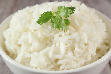 Close up, White rice in bowl on wood table