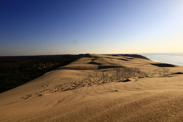 Fototapeta na wymiar The Dune of Pilat is the tallest sand dune in Europe. It is located in La Teste-de-Buch in the Arcachon Bay area, France