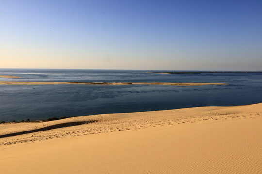 The Dune of Pilat is the tallest sand dune in Europe. It is located in La Teste-de-Buch in the Arcachon Bay area, France