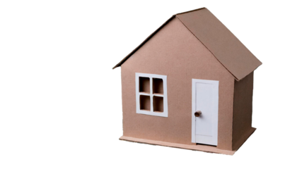 Cardboard house on transparent background, housing concept
