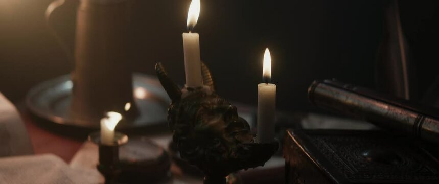 Candles inside the vintage sailing ship