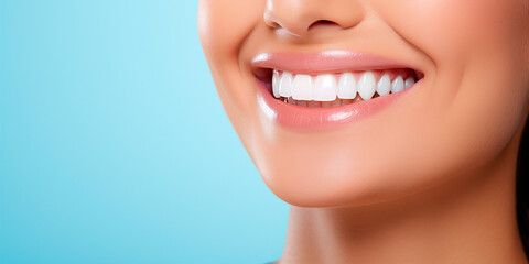 Obraz premium Female beautiful snow-white smile, perfect white teeth, face close-up on blue background, profile, copy space