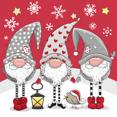 Christmas card with Three cute Gnomes on a red background