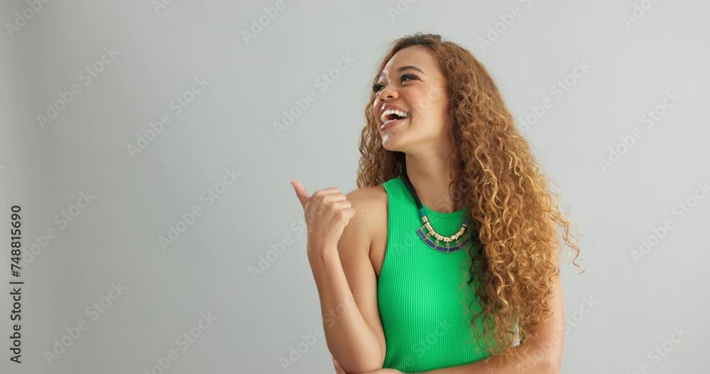 Poster Happy woman, pointing and advertising with mockup space for marketing on a gray studio background. Portrait of excited female person with smile for notification, alert or discount deal on promotion