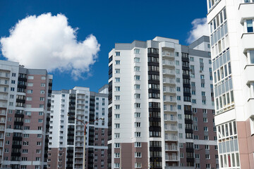 Fototapeta na wymiar Modern residential area, houses on a sunny day. Exterior, facade of a residential building.