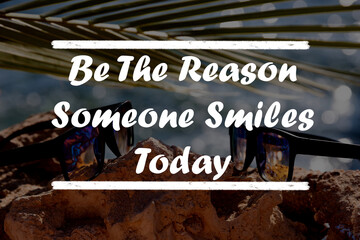 Inspirational quote on a natural landscape background. Be The Reason Someone Smiles Today.