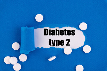 The text Diabetes type 2 appearing behind torn blue paper.