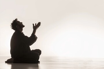 a Muslim person praying to god looking up with prayer hands
