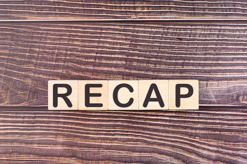 RECAP word made with wood building blocks