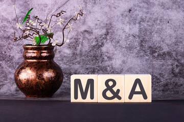 Word MBA made with wood building blocks on a gray background