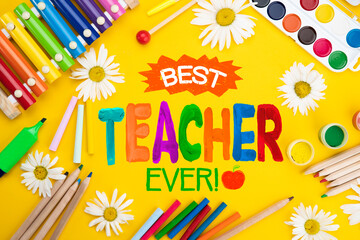 Childish lettering for Teachers' Day. Appreciation of teachers top view flat lay concept. Colored...