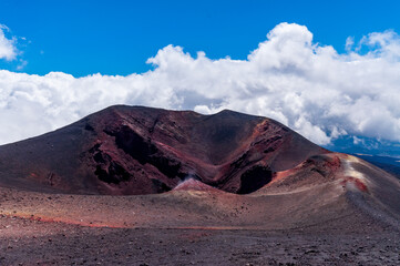 a trip to the Etna volcano with typical rock scenery
