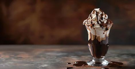 Fototapeten A glass of delicious ice cream with chocolate syrup and whipped cream © mizan