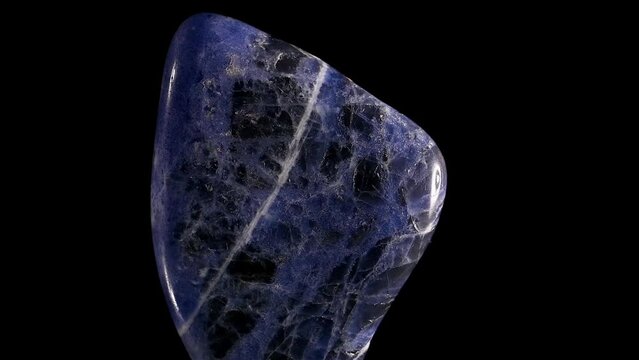 Sodalite tumblestone (silicate occurring as dodecahedral crystals)