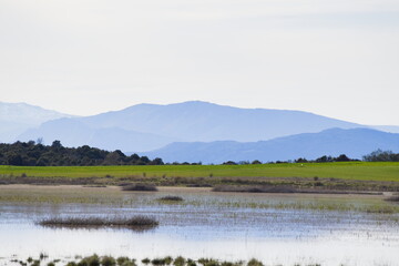 View of the lagoons of Puebla de Bele&ntilde;a with the Sierra de Ayllon in the background