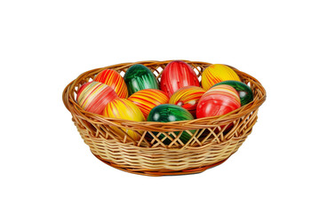 Fototapeta na wymiar Hand painted Easter eggs in wicker basket, transparent background - festive decor
