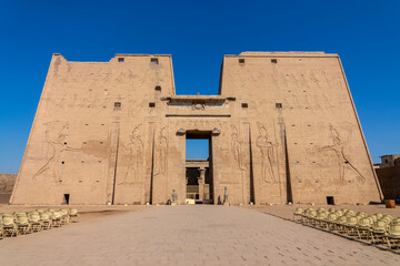 Entrance and facade of the ancient egyptian temple of Edfu on the Nile river West bank, Egypt - 748849408