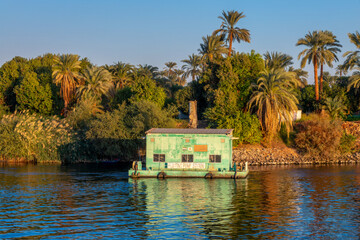 Floating pump station, water pumping for irrigation on the Nile river, Egypt - 748851217