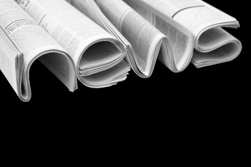 Folded modern newspapers. Concept of business news and print media - obrazy, fototapety, plakaty