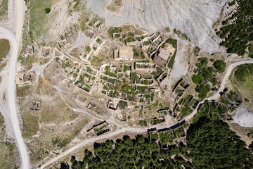 Aerial view of ruins of village of Escó by Yesa reservoir in Spain, Summer 2023
