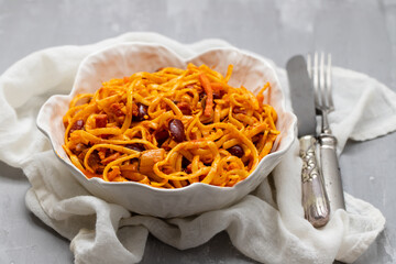 Noodles Tai style mixed with spicy tomatoes and meat