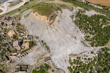 Aerial view of ruins of village of Esc&oacute; by Yesa reservoir in Spain, Summer 2023