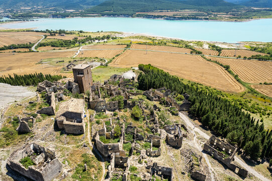Aerial view of ruins of village of Esc&oacute; by Yesa reservoir in Spain, Summer 2023