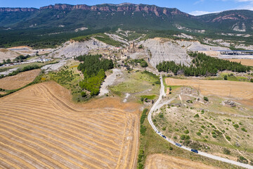 Aerial view of ruins of village of Escó by Yesa reservoir in Spain, Summer 2023