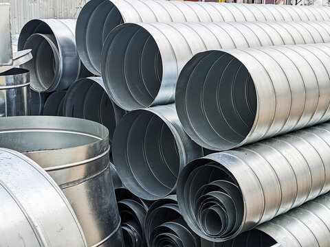 Close-up of Aluminum Ventilation Tubes at a Construction Site