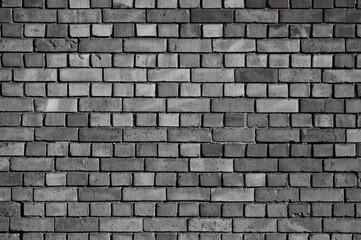 old brick wall close up in gray color