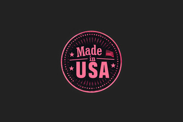 Fototapeta na wymiar Pink Made in USA badge on dark background
