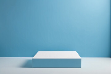 Empty pedestal display on blue background with blank stand for product show or presentation