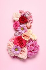 8 March greeting card design made with beautiful flowers on pink background, top view