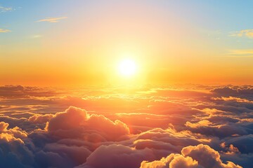 Immerse yourself in the serene charm of Sunrise Over Clouds, as the morning sun bathes the sky in a warm and breathtaking glow. - obrazy, fototapety, plakaty